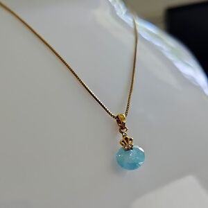 Gold Necklace with Light Blue Gem